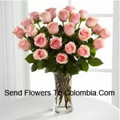 24 Pink Roses With Some Ferns In A Vase