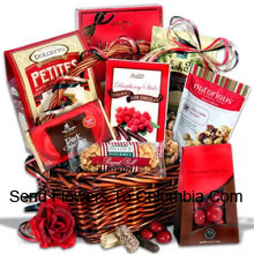 Un panier-cadeau exclusif pour la Saint-Valentin contenant des tablettes de chocolat noir, des petites gaufrettes au chocolat, des barres de toffee anglais, des cerises au chocolat, des confiseries aux noix et à la vanille de cerise, un rouleau de cacahuètes, des bâtonnets de chocolat noir à la framboise et une boîte de toffee au beurre Almond Roca (Veuillez noter que nous nous réservons le droit de substituer tout produit par un produit approprié de valeur égale en cas de non-disponibilité d'un certain produit)